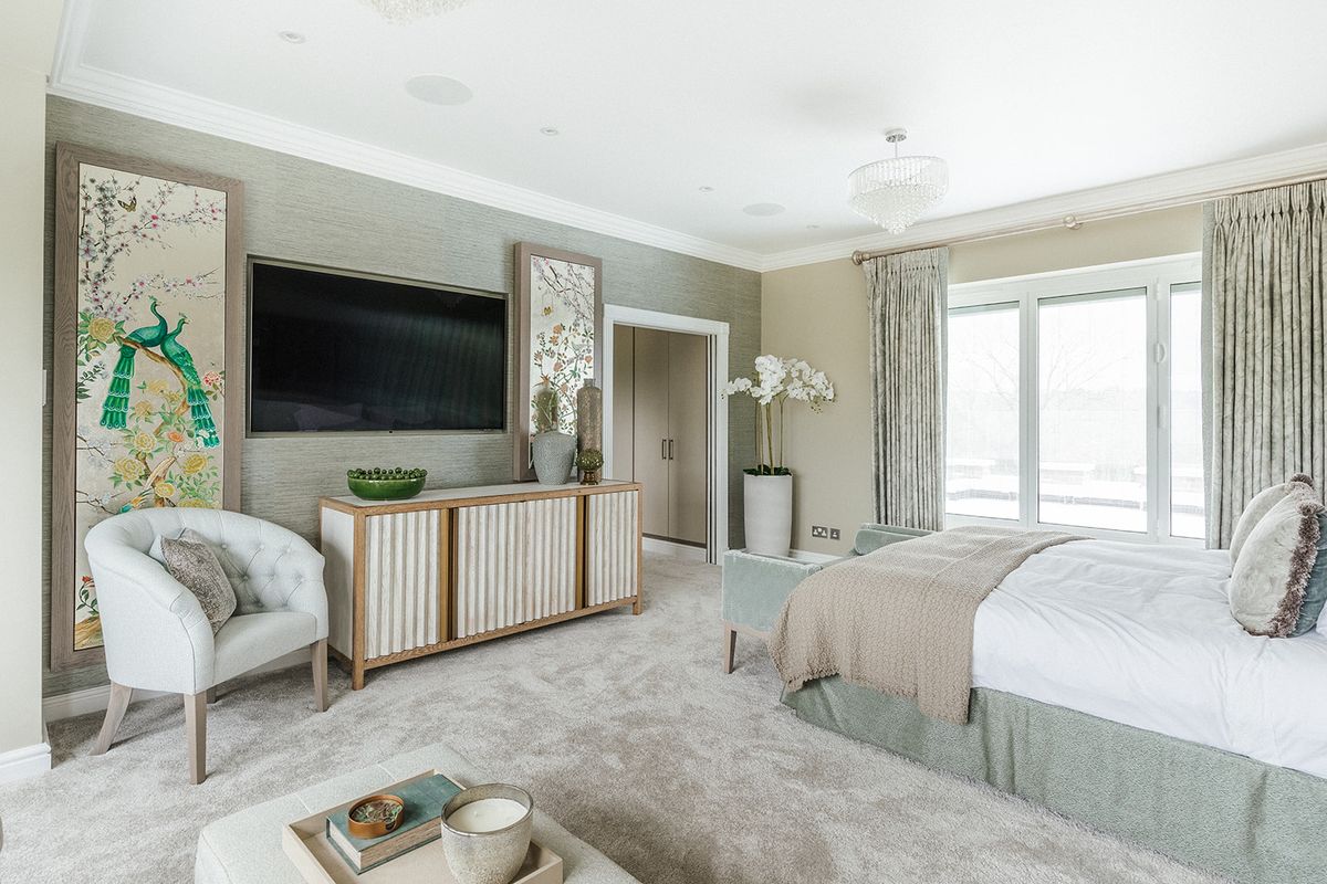 Luxury master bedroom with bespoke media unit and chinoiserie panels