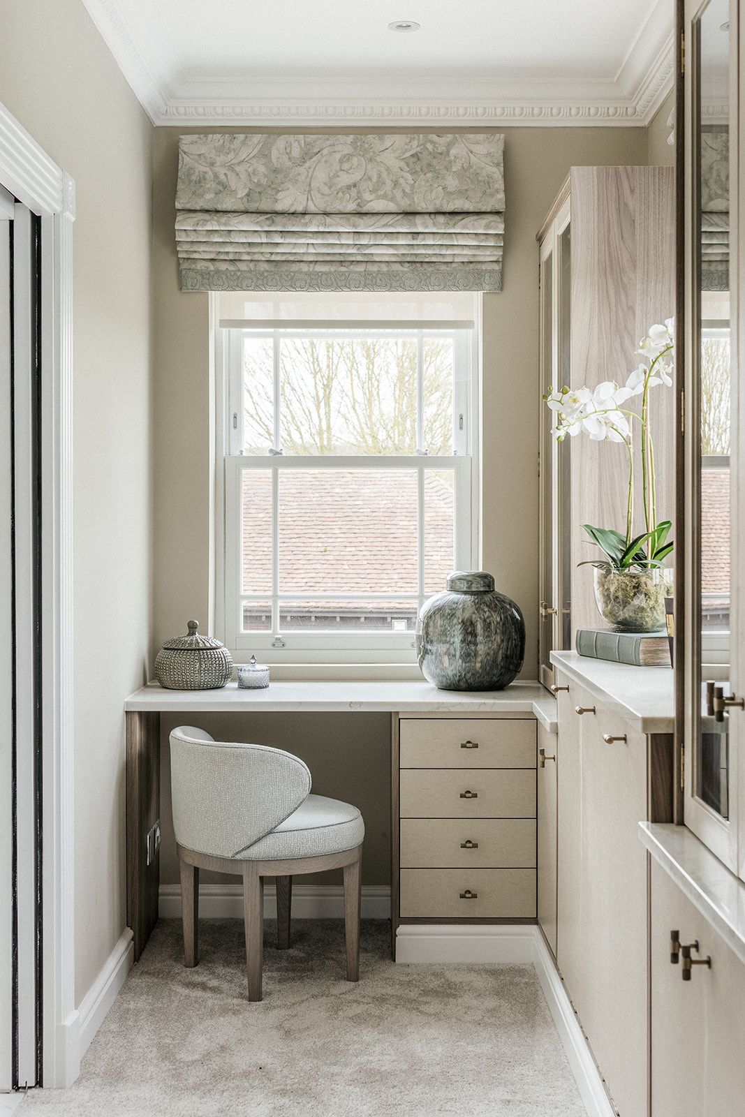 Bespoke dressing vanity with orchid arrangement